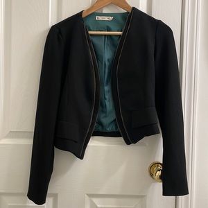 Stylish black blazer with teal lining